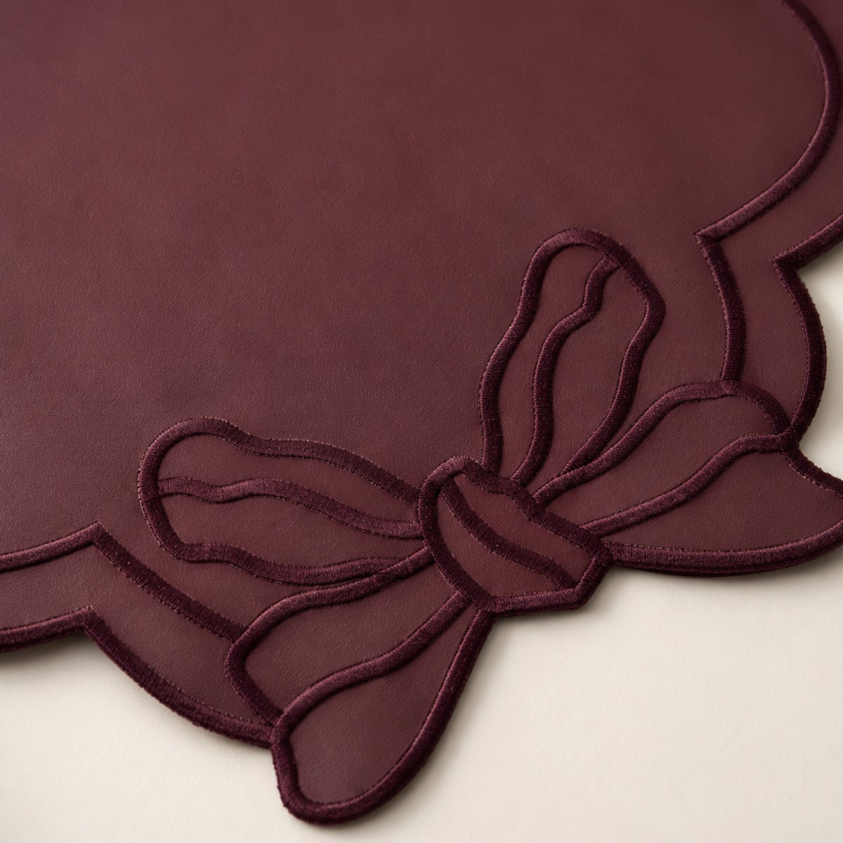 Bow Embroidered Faux Leather Placemat Set – 6 Pieces