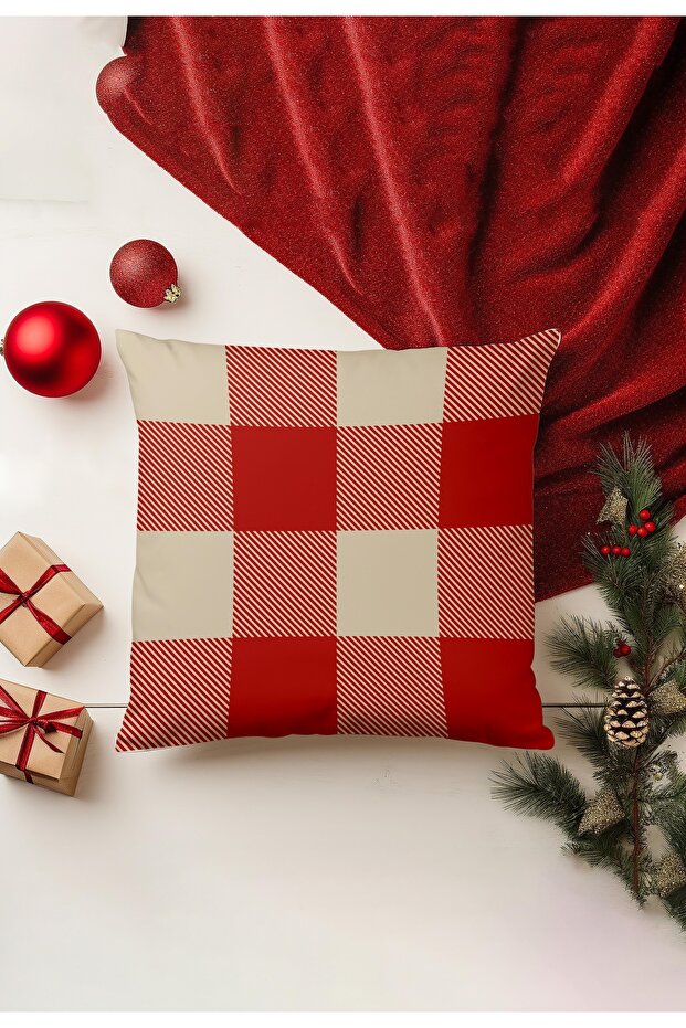 Red and beige checkered pillow with Christmas decorations on a white background