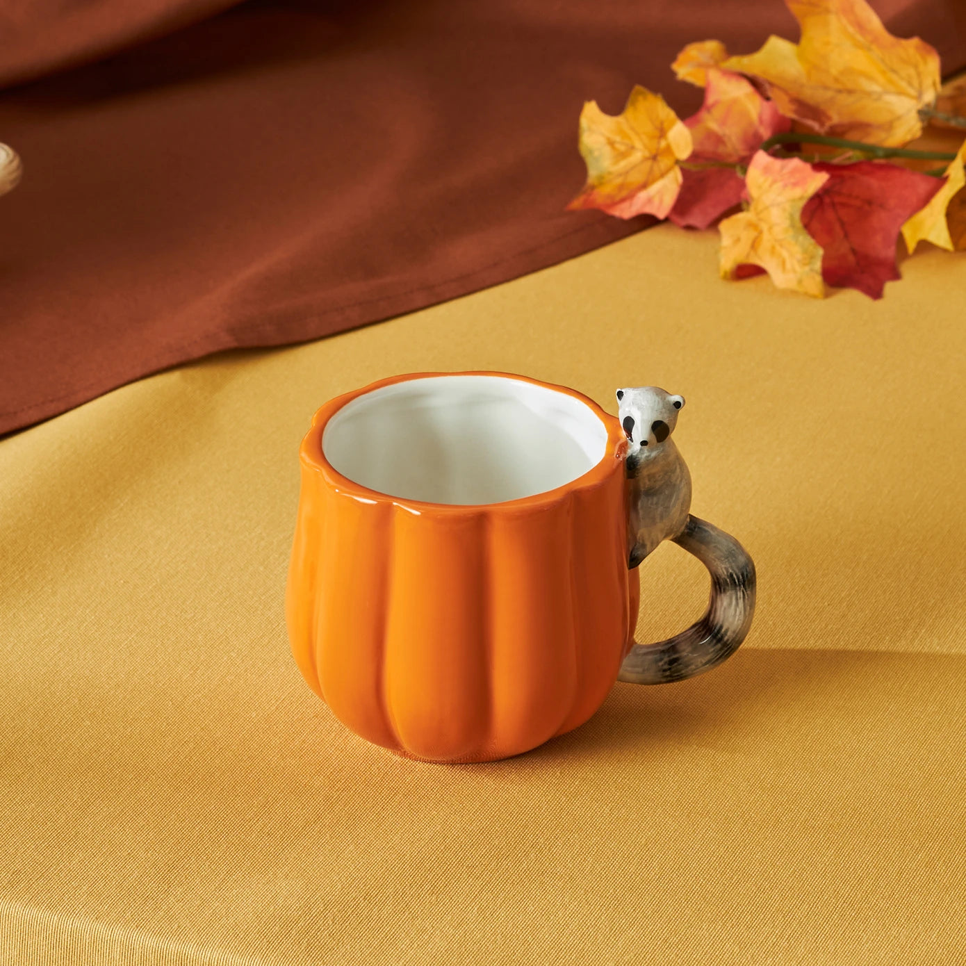 Cozy Pumpkin Raccoon Mug 320 ml